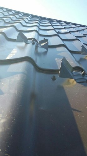 Metal tile roofing