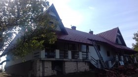 Metal tile roofing system