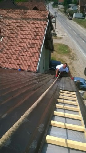 Metal tile roofing