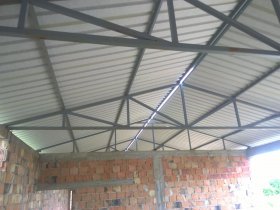 Trapezoidal roofing sheet